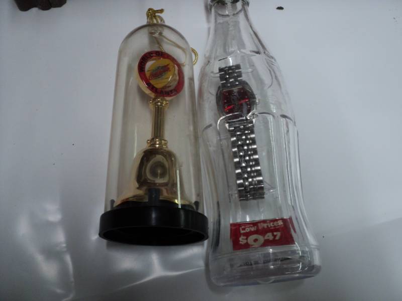 lot 64 image: Coca Cola Bell and Watch in a Bottl...