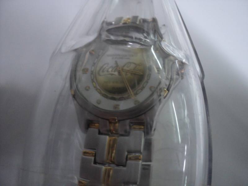 lot 66 image: Coca Cola Watch in a Bottle...
