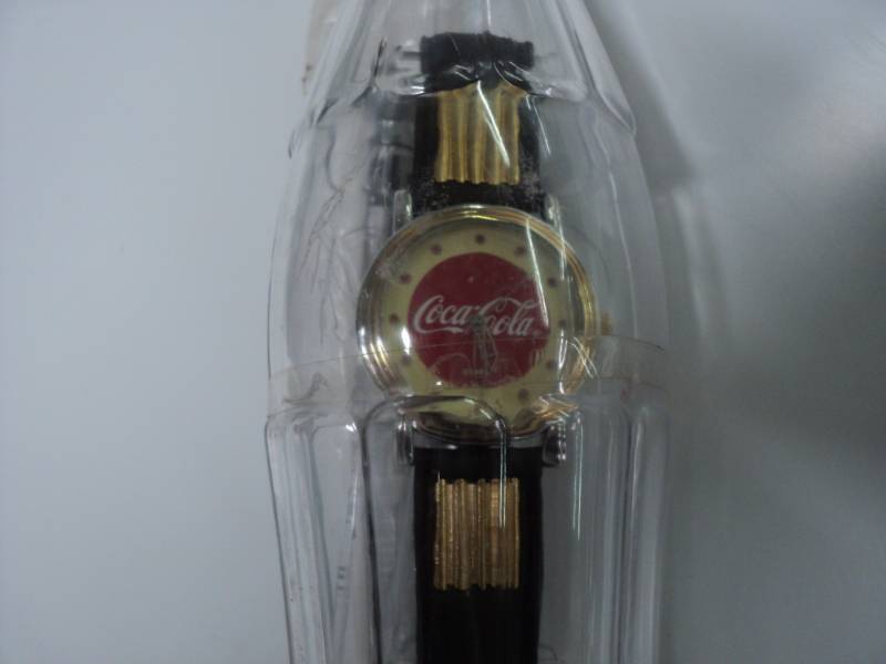 lot 67 image: Coca Cola Watch in a Bottle...