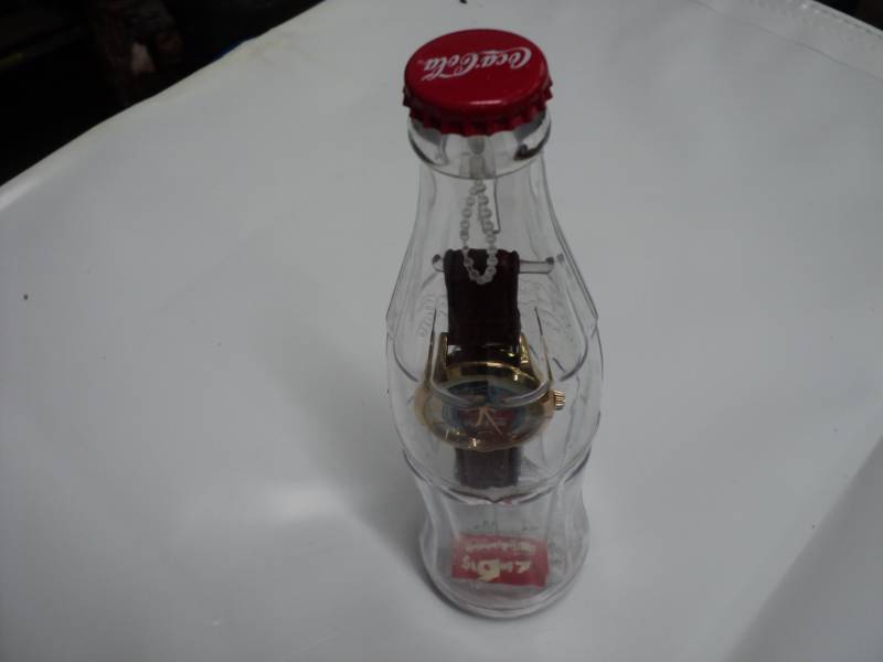 lot 68 image: Coca Cola Watch in a Bottle...
