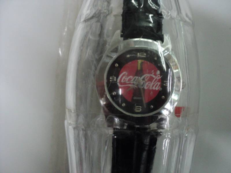 lot 70 image: Coca Cola Watch in a Bottle...
