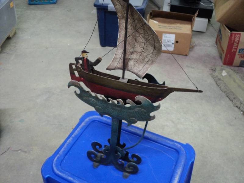 lot 145 image: Iron Boat Balancing Dcor...
