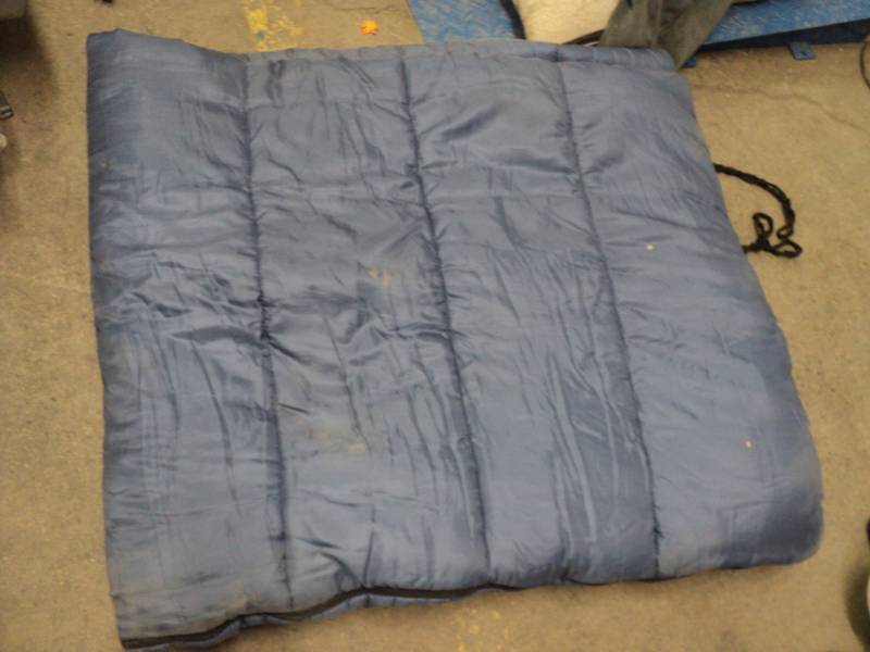 lot 220 image: Blue Sleeping Bag...