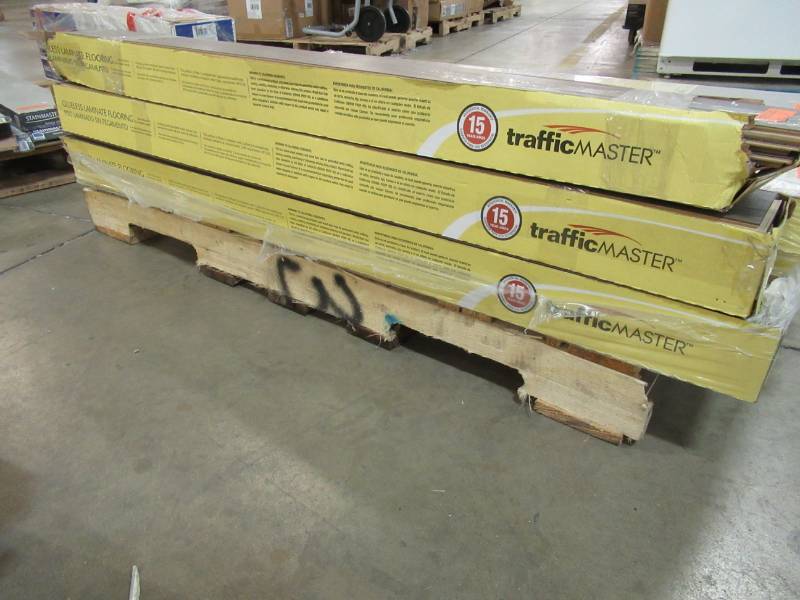 lot 194 image: TrafficMaster Colfax 12 mm Thick x 4-1516 in. Wide x 50-34 in. Length Laminate Flooring 4838CWI3436RE21 (14 sq. ft.  case) - 3 Cases