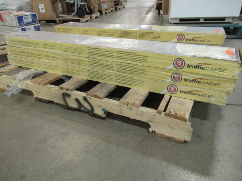 lot 195 image: TrafficMaster Kingston Peak Hickory 8 mm Thick x 7-916 in. Wide x 50-34 in. Length Laminate Flooring FB0346DYI2856WG001 (21.44 sq. ft.  case) - 3 Cases