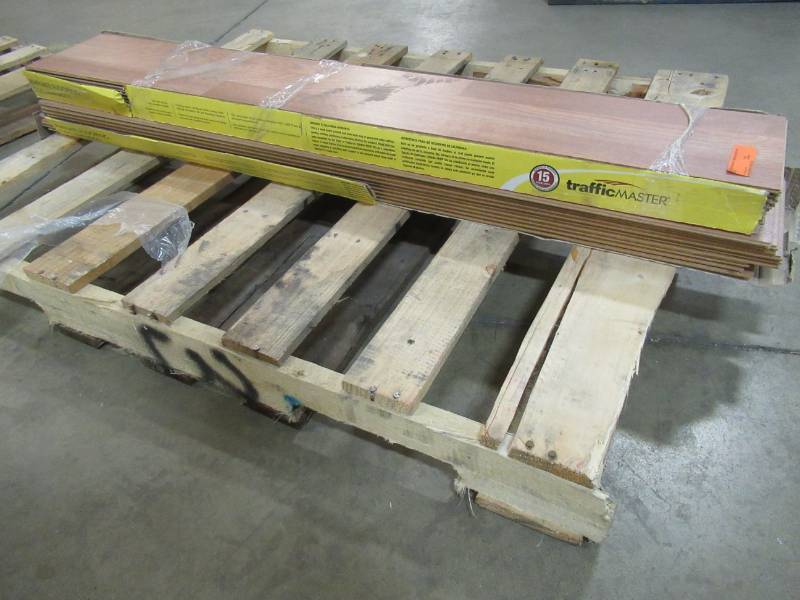 lot 199 image: TrafficMaster Golden Oak 7 mm Thick x 7.64 in. Wide x 50.79 in. Length Laminate Flooring (24.24 sq. ft.  case) - 2 Cases