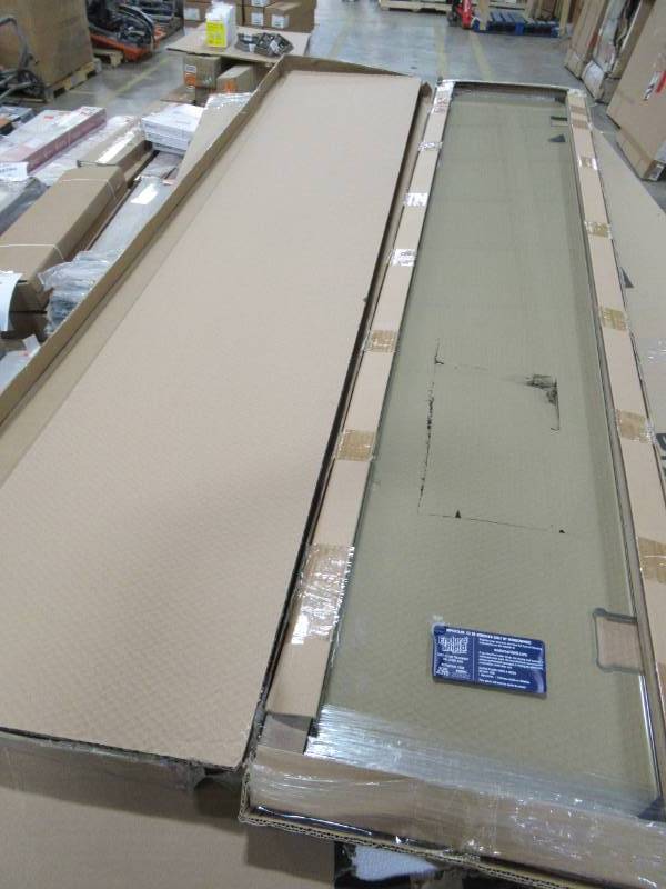 lot 284 image: Glass Warehouse 13 X 78 Custom Clear Glass Panel with Routed Hinge Mounts. No Hardware
