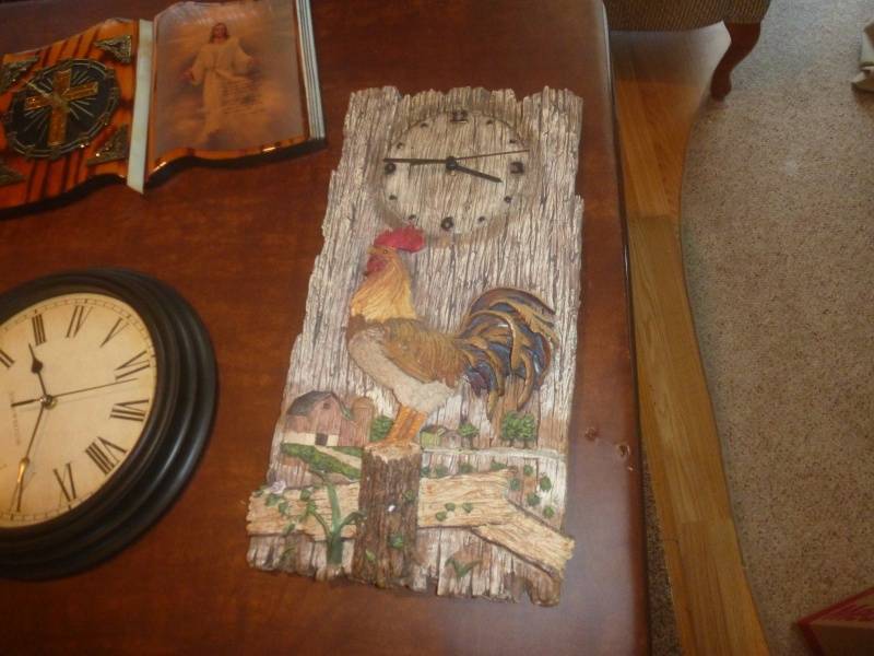lot 127 image: Item # 72 Bible Clock, Chicken Clock, Black clock