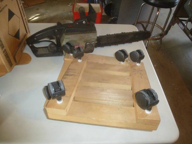 lot 162 image: Item # 106 Assorted Door Handles, Chain saw