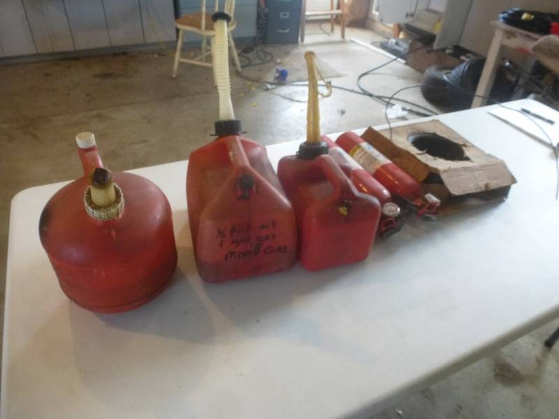 lot 163 image: Item # 107 Red Gas Cans, Fire Extinguisher
