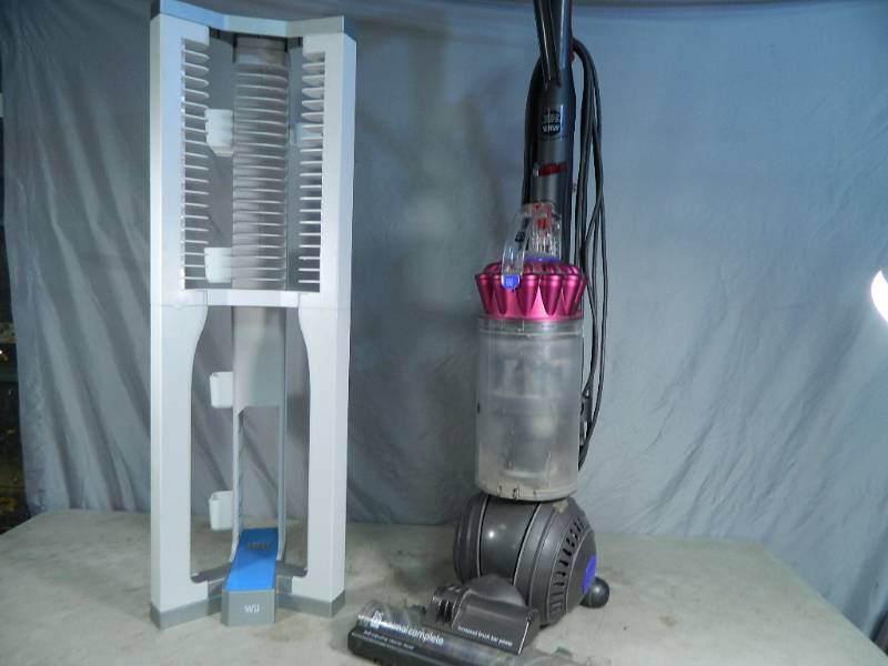 lot 113 image: Dyson Vacuum and Wii Stand