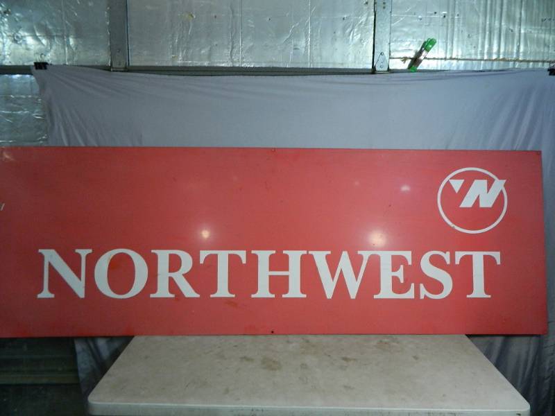 lot 3 image: Vintage Aluminum Northwest Airlines Ticketing Airport Sign