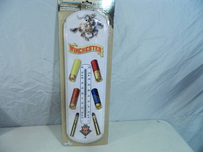 lot 29 image: New Winchester Tin Thermometer