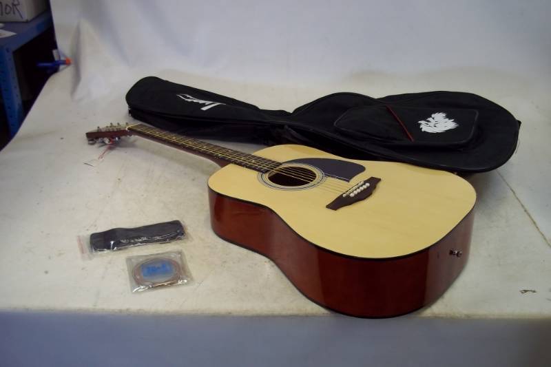 George Washburn Lyons Guitar with strap, case and extra strings