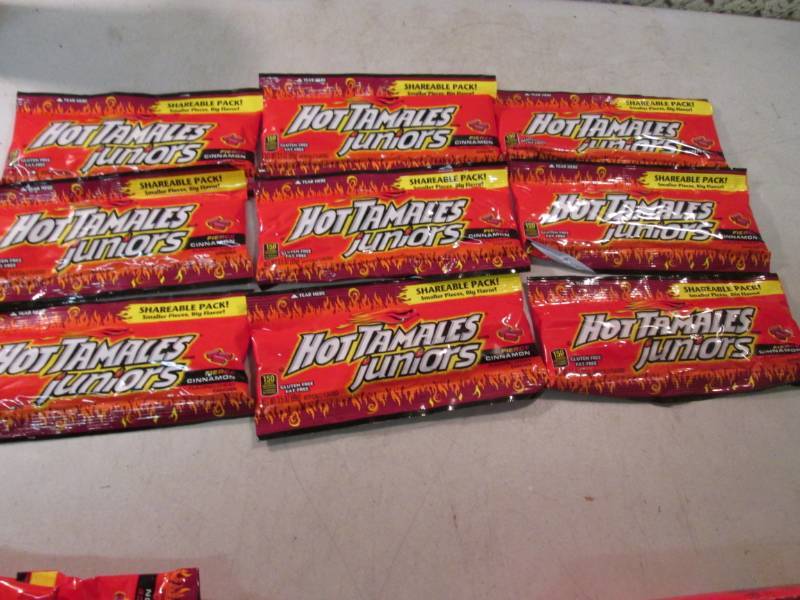 lot 207 image: 9 Share Size Bags of Hot Tamales Ju...