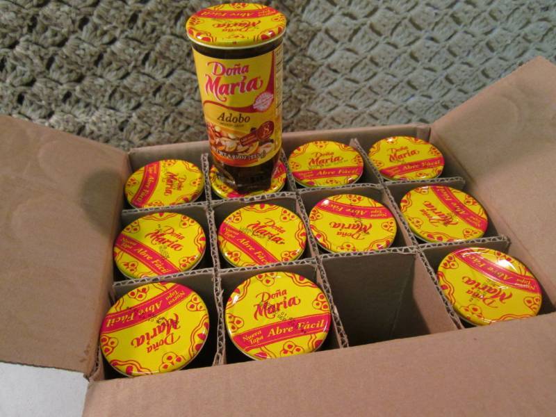 lot 244 image: Case of 12 Jars of Dona Maria Adobo...