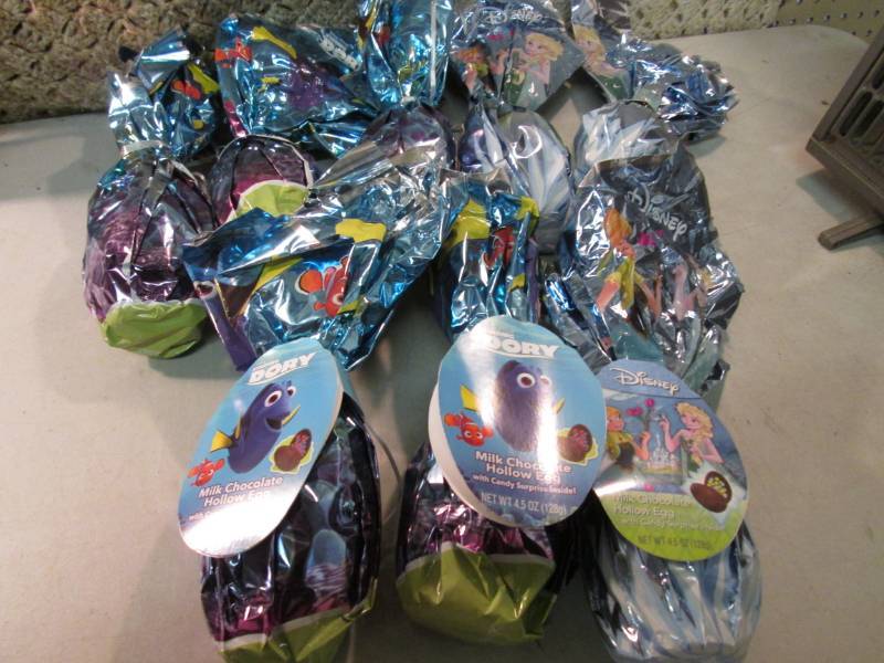 lot 277 image: 8 Disney Milk Chocolate Hollow Eggs...