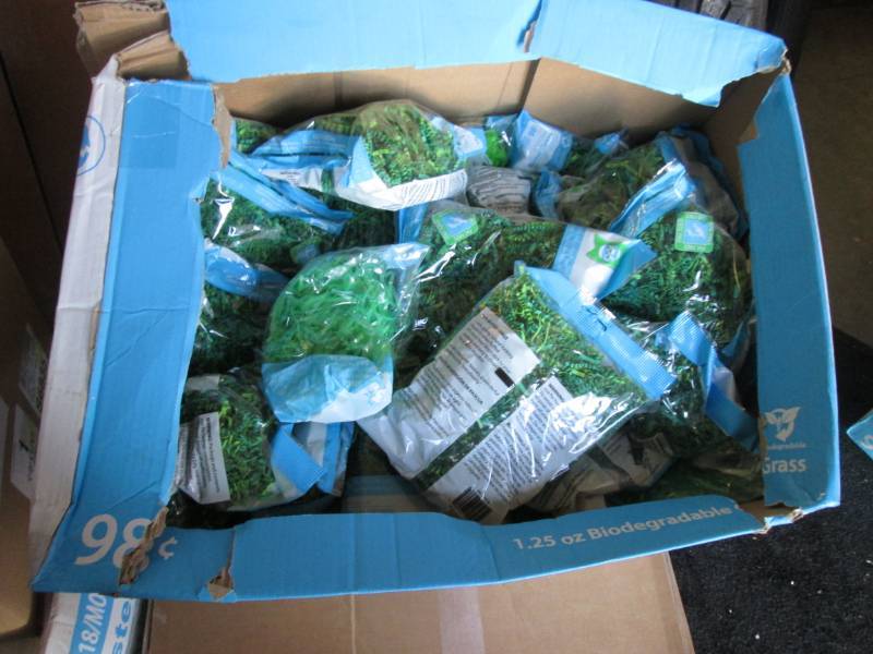 lot 303 image: Open case of Green Easter Basket Gr...