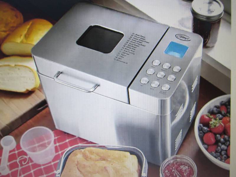 lot 29 image: Bread Machine by Ginnys open box, ...