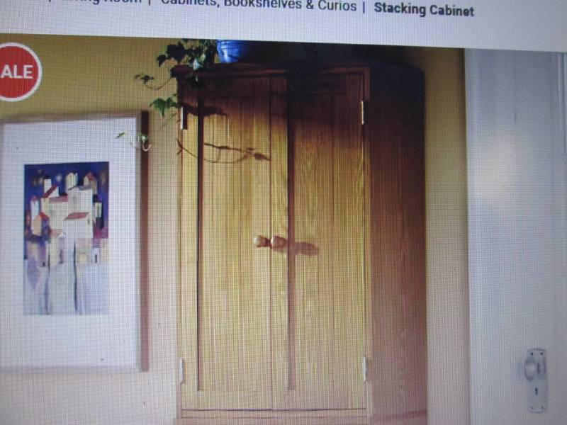 lot 57 image: Stacking Cabinet open box Retail $9...