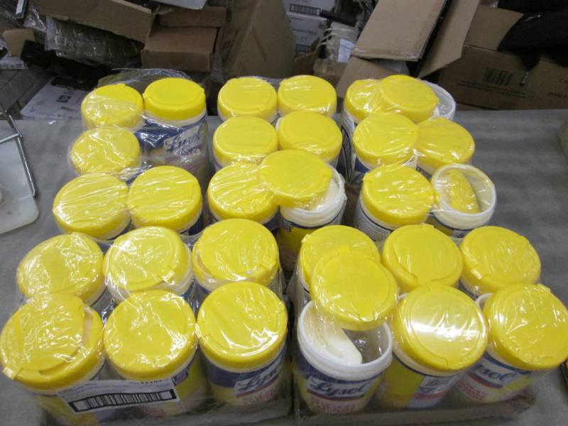 lot 76 image: Large Lot of Damaged Canister Lysol...