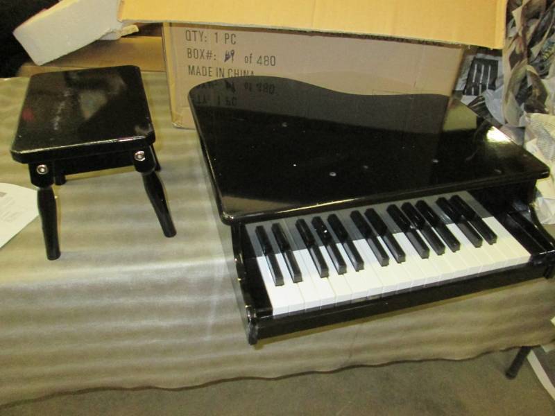 lot 86 image: Child Size Piano open box, scuffed ...