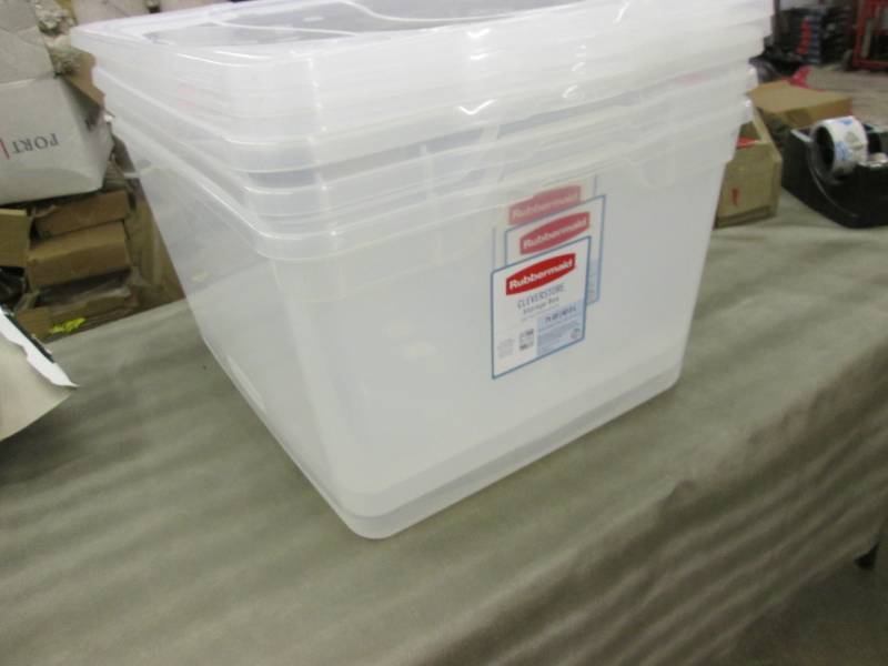 lot 129 image: 3 Rubbermaid 71 qt Storage Boxes...