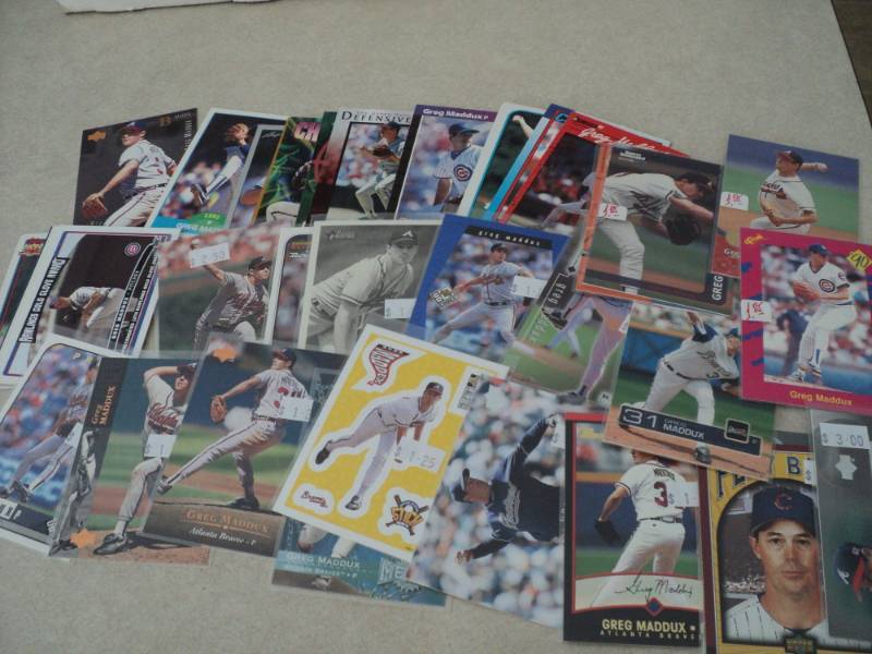 40 Greg Maddux Cards...