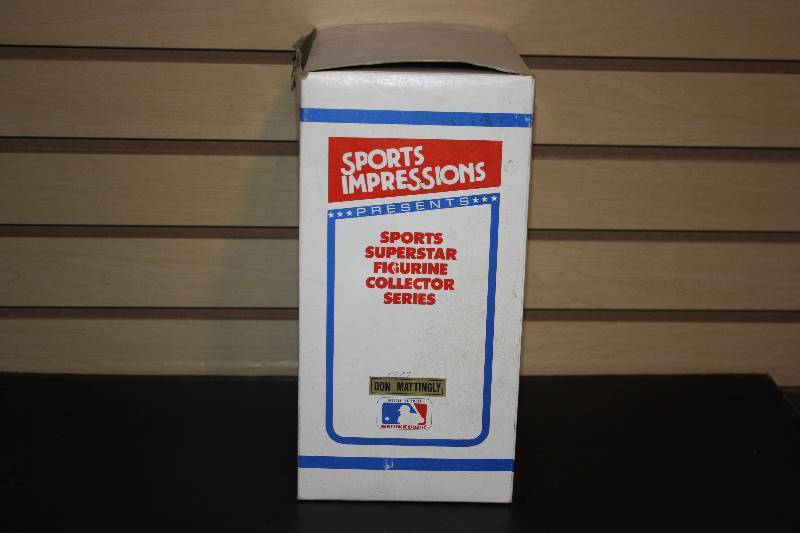 lot 12 image: Sports Impressions Don Mattingly Figure and Card Lot