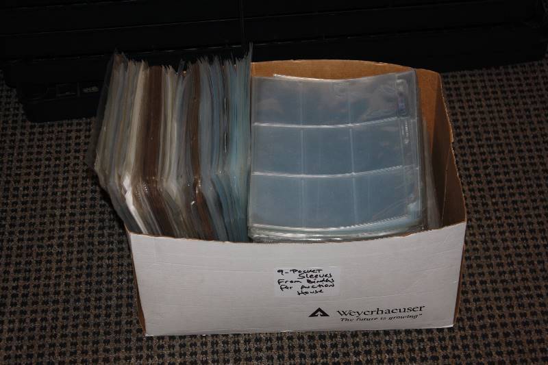 lot 34 image: Banker Box Full of Used 9 Pocket Pages