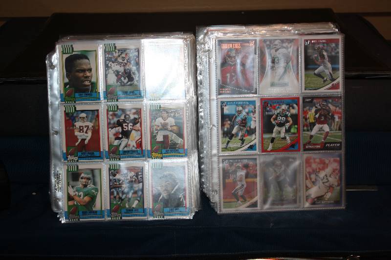 lot 36 image: Lot of 9 Pocket Pages with Football Cards