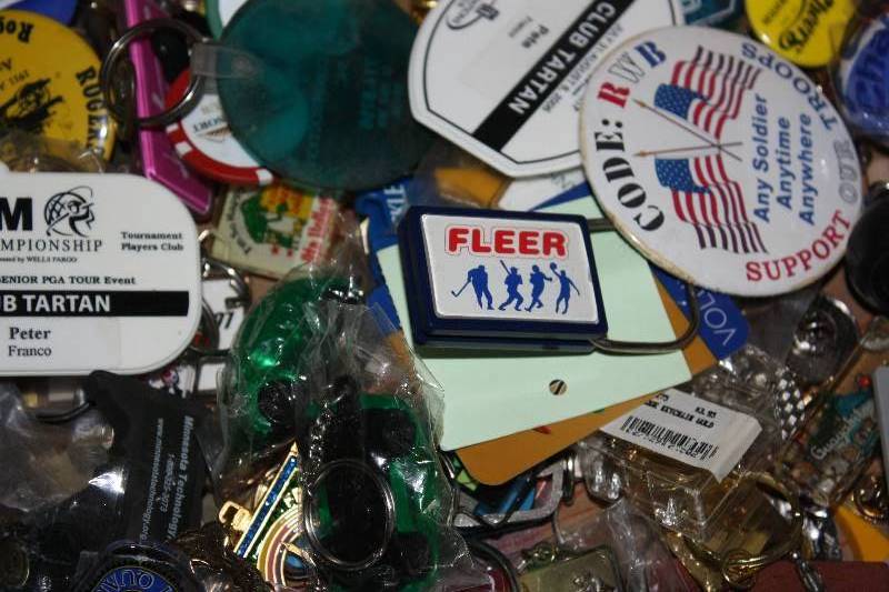 lot 89 image: Large Lot of Pins Buttons and Keychains
