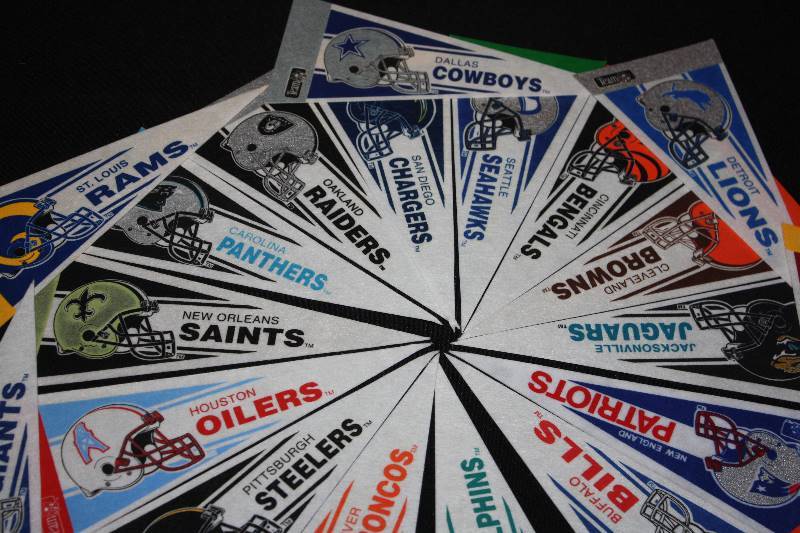 lot 103 image: Lot of 21 NFL Mini Pennents