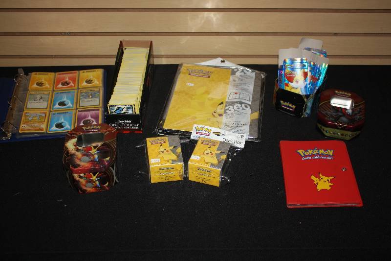 lot 128 image: Large Lot of Pokemon Cards and Supplies