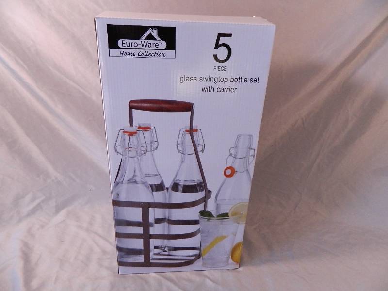 lot 21 image: New 5 Piece Glass Bottle Set with Carrier