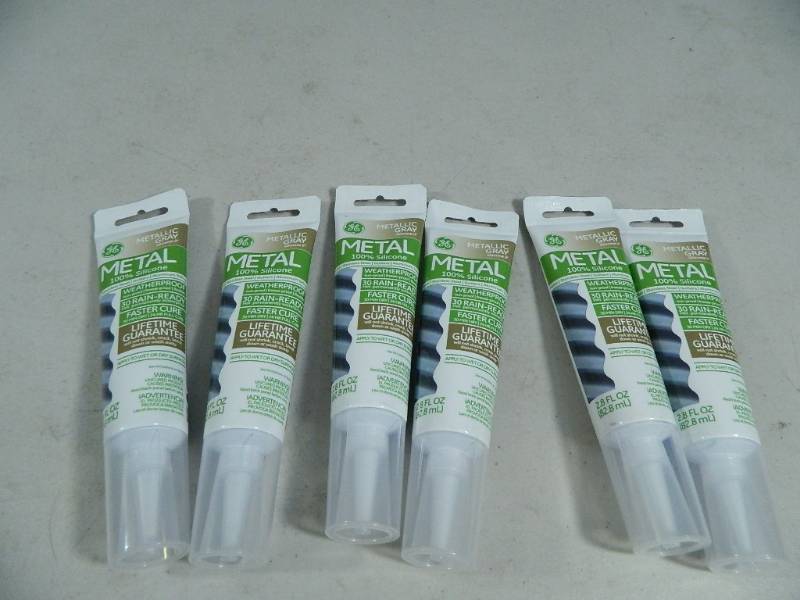 lot 125 image: 6 New Tubes of Metal 100% Silicone