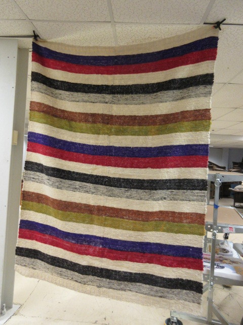 lot 660 image: WOOL HAND WOVEN BLANKET