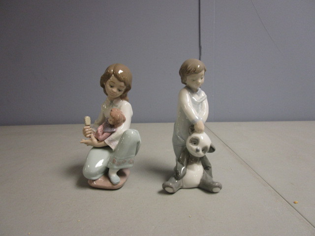 lot 695 image: LLADRO FIGURINES THOUGHTFUL CARESS AND FIRST DISCOVERIES