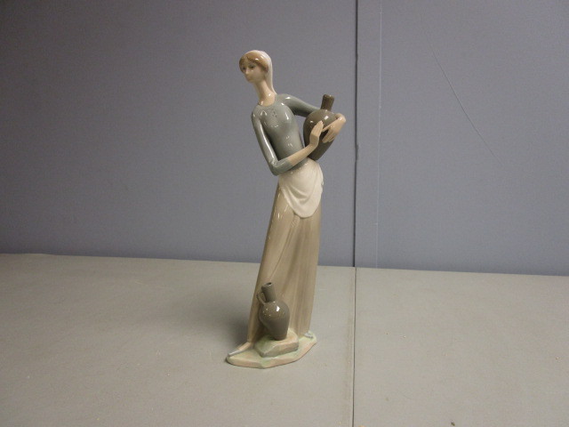 lot 696 image: LLADRO GIRL WITH JUGS