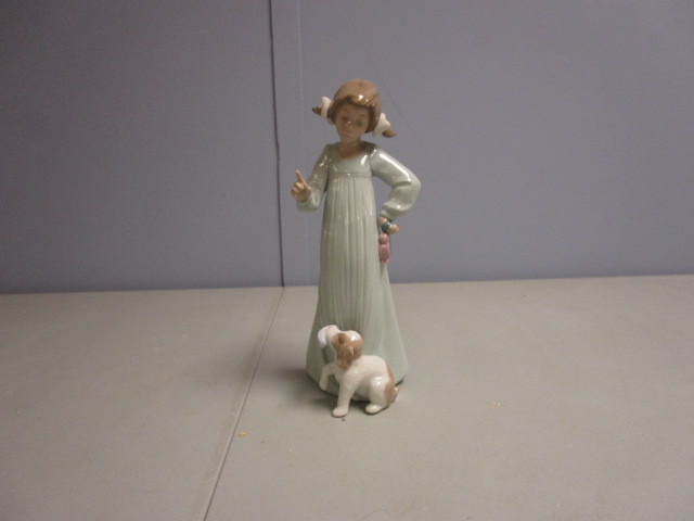 lot 698 image: LLADRO NAO FIGURINE TITLED GIRL WITH PUPPY DOG