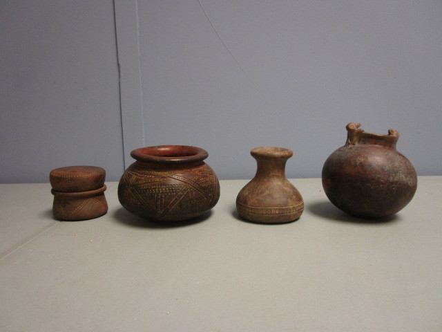 lot 703 image: PRIMITIVE TERRA COTTA  VESSELS