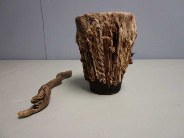 lot 707 image: COLUMBIAN HAND MADE DRUM AND SOME PETRIFIED WOOD