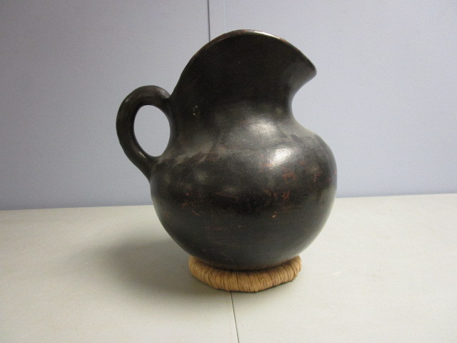 lot 710 image: LARGE POTTERY PITCHER WITH RUSH STAND
