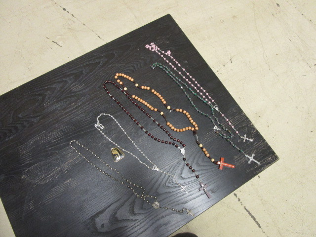 lot 803 image: PEARL, STONE, AND WOOD ROSARIES PLUS A RELIGIOUS PENDANT