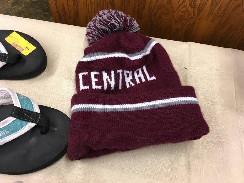 lot 91 image: UND Flip Flops, Grand Forks Central Beanie, & Golf Shoes