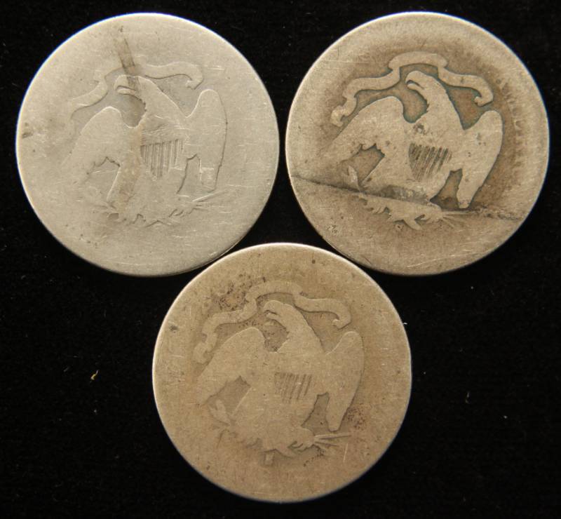 lot 16 image: 3 SEATED LIBERTY QUARTERS 1875-S 1876-S 1877-S
