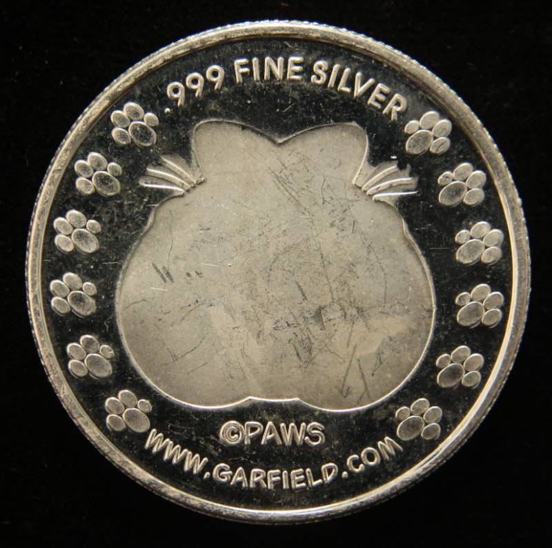 lot 21 image: 1 TROY OZ. .999 FINE SILVER GOD BLESS AMERICA