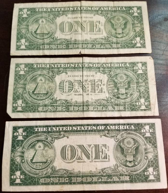 lot 09-A image: 3 US BLUE SEAL SILVER CERTIFICATES 1957 1957-A 1934-C