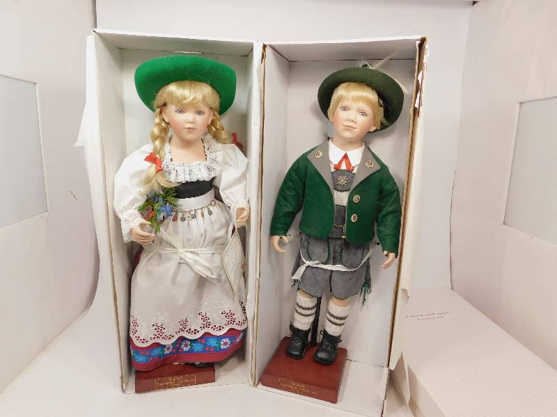 lot 72 image: Schneider Porcelain Dolls Appenzell Boy and Girl Set