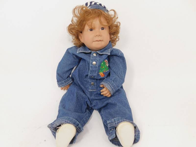 lot 75 image: Cute Vinyl Doll